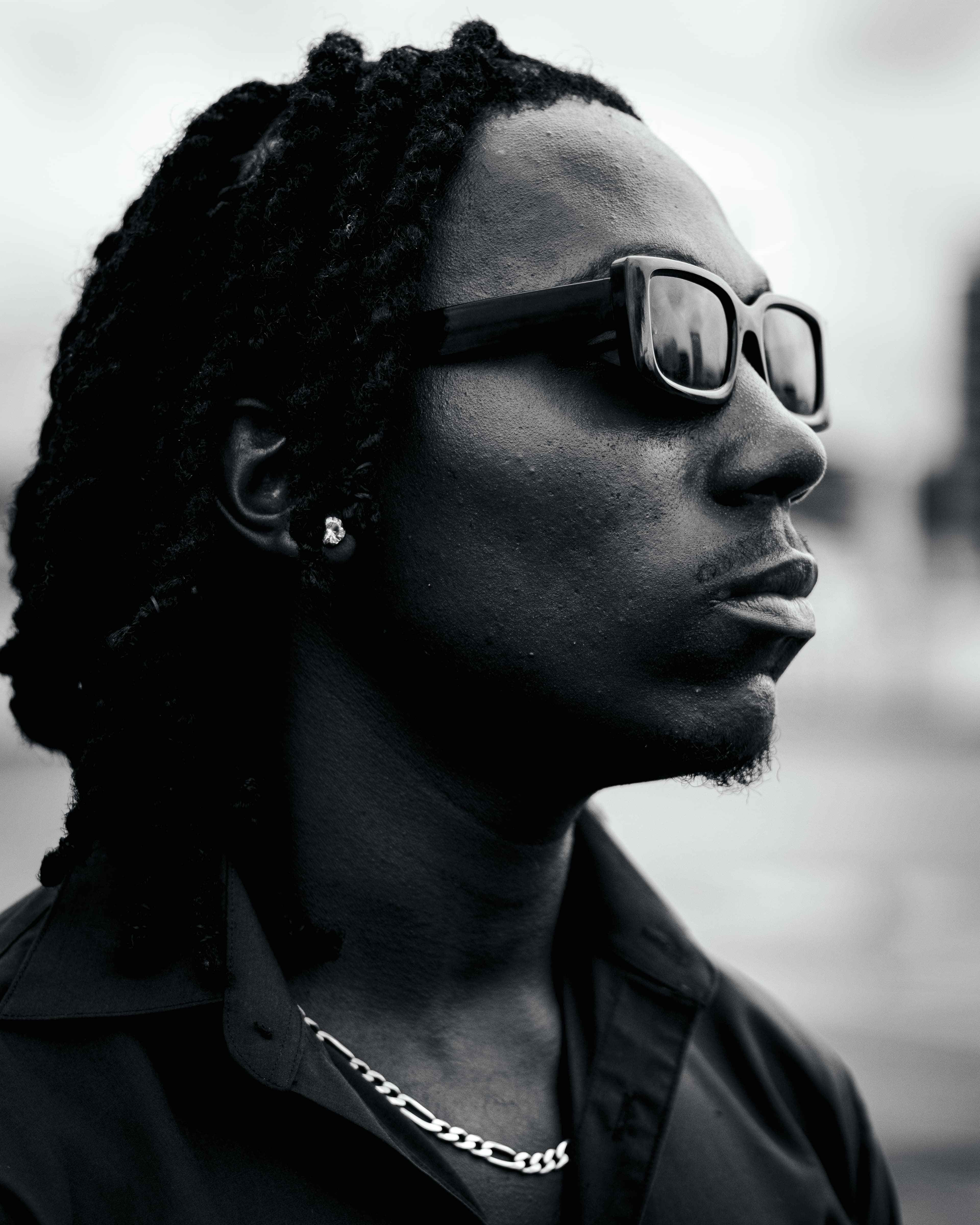 Black and white close profile portrait with sunglasses